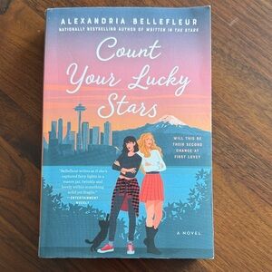Avon 'Count Your Lucky Stars' Book Cover with Blue and Orange